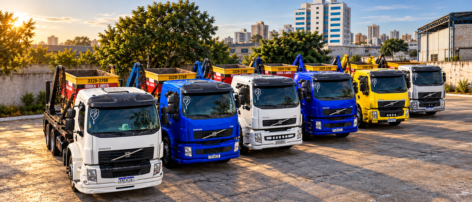 Imagem editada da frota Obra Limpa: seis caminhões Volvo com caçambas alinhados no pátio ao entardecer